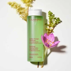 Clarins - Lotion Tonique Purifiante Aux Extraits De Reine Des Prés & Fleur De Safran - Peaux Mixtes à Grasses -Parfumerie Burdin Boutique clarins lotion tonique purifiante aux extraits de reine des pres fleur de safran 4
